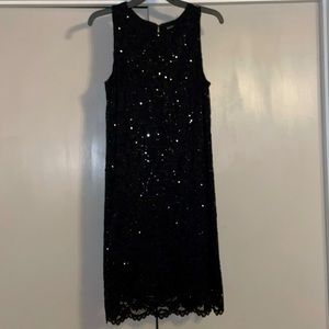 Marina black sequin sleeveless dress.